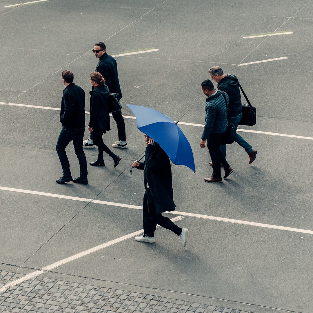 Man walking with BLUNT Exec Ocean Blue